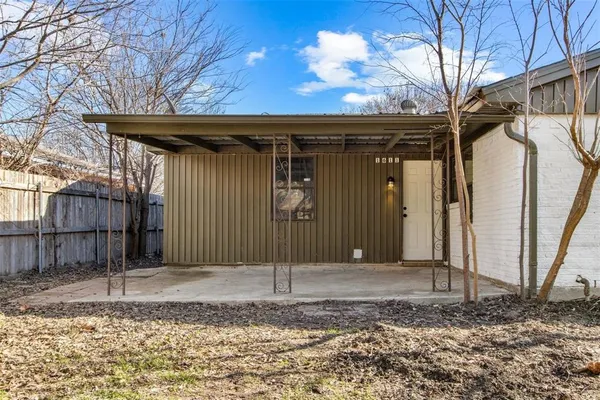 a view of a yard covered with snow in the yard