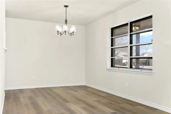 a view of a room with a large window