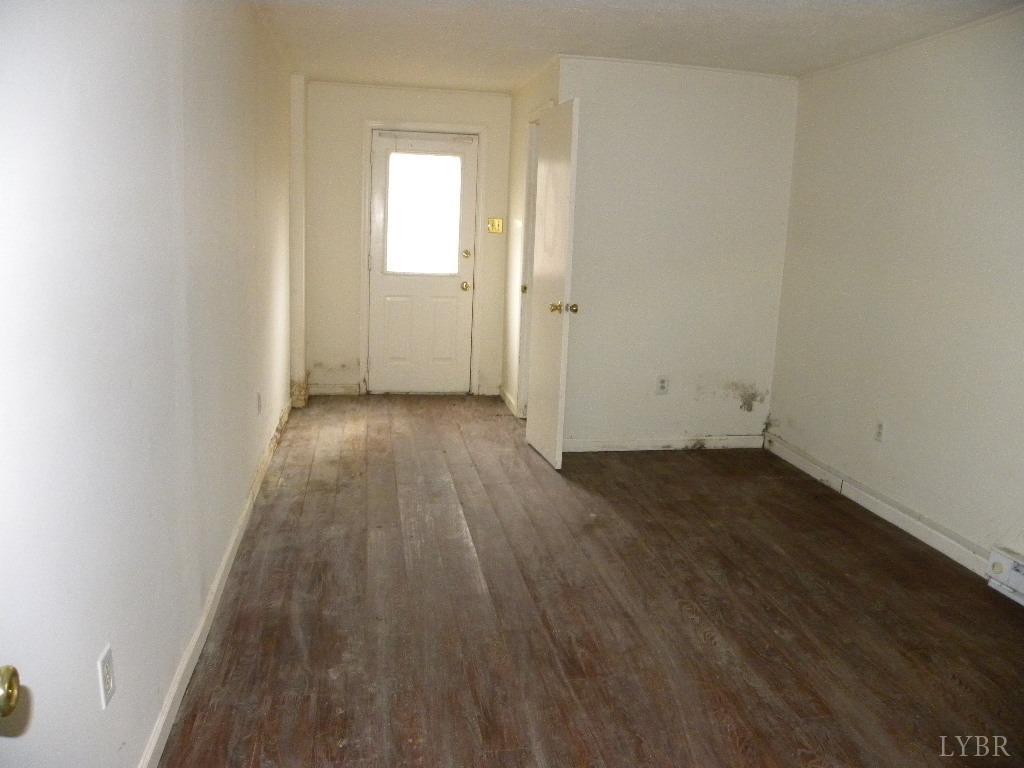 188 Petunia Road Ruckersville, VA 22968 - Photo 13 of 13 an empty room with wooden floor and windows