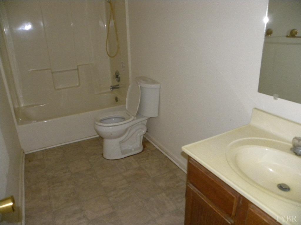188 Petunia Road Ruckersville, VA 22968 - Photo 4 of 13 a bathroom with a sink a toilet and shower