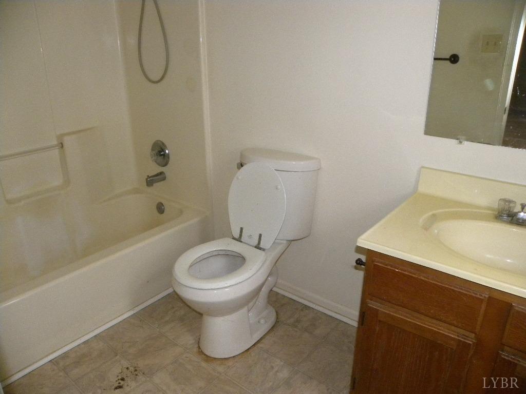 188 Petunia Road Ruckersville, VA 22968 - Photo 7 of 13 a bathroom with a sink toilet and shower