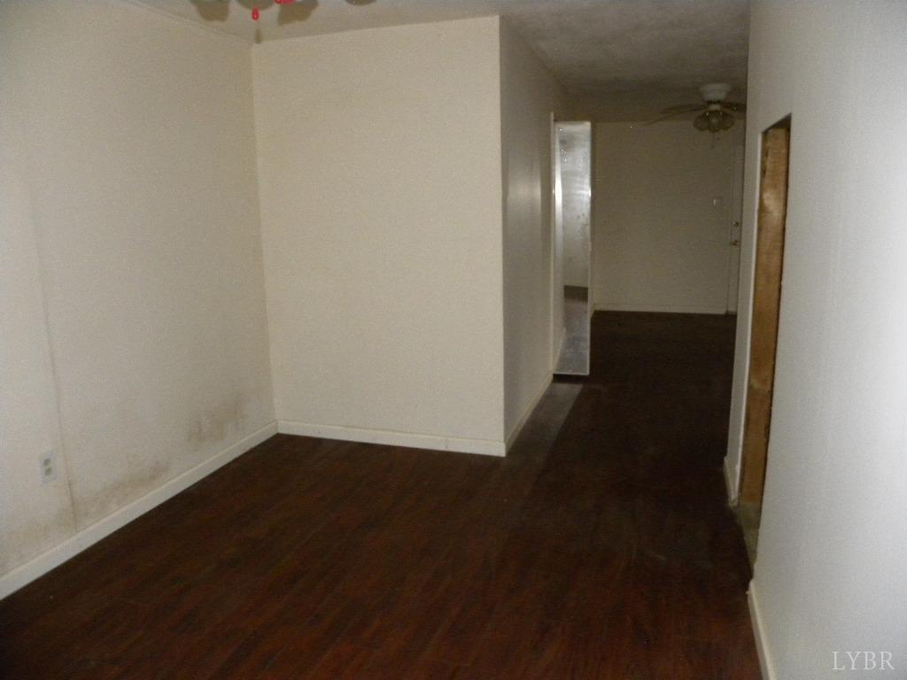 188 Petunia Road Ruckersville, VA 22968 - Photo 9 of 13 a view of a hallway with wooden floor