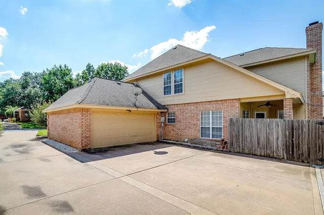 a front view of a house with a garage