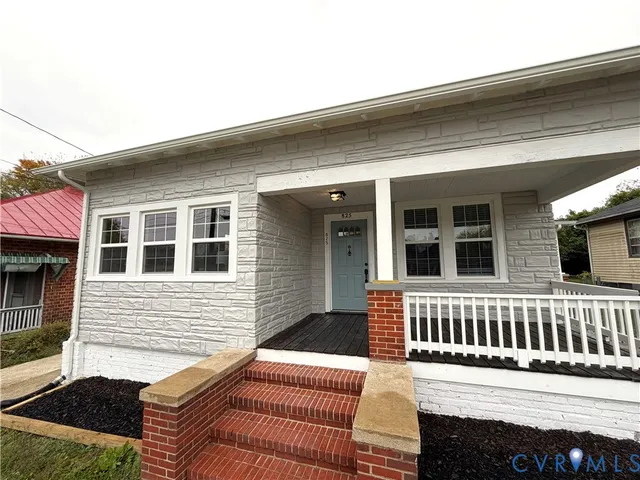 a view of a house with a roof deck