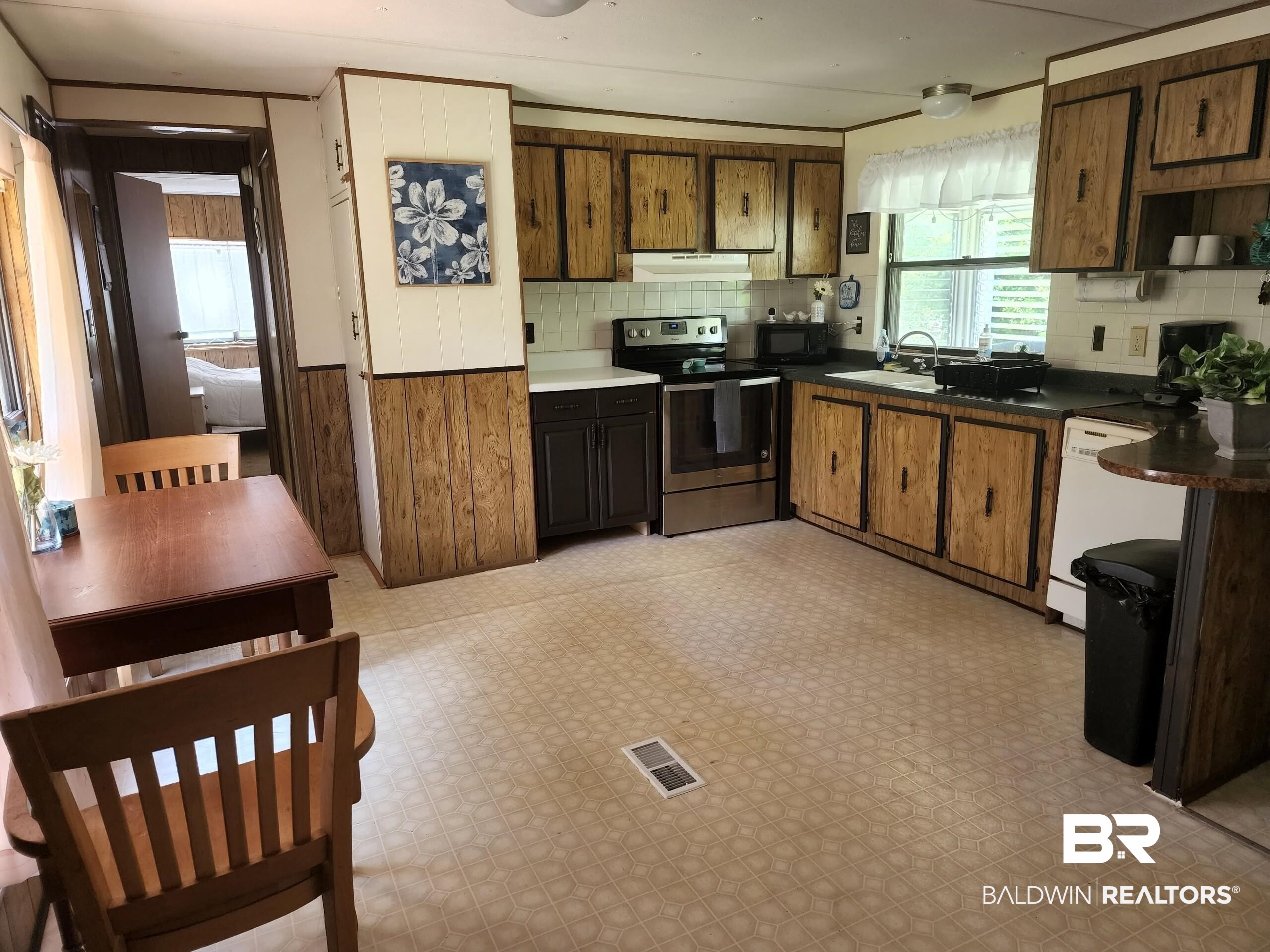 1353 Caney Loop Lillian, AL 36549 - Photo 25 of 32 Kitchen/Dining