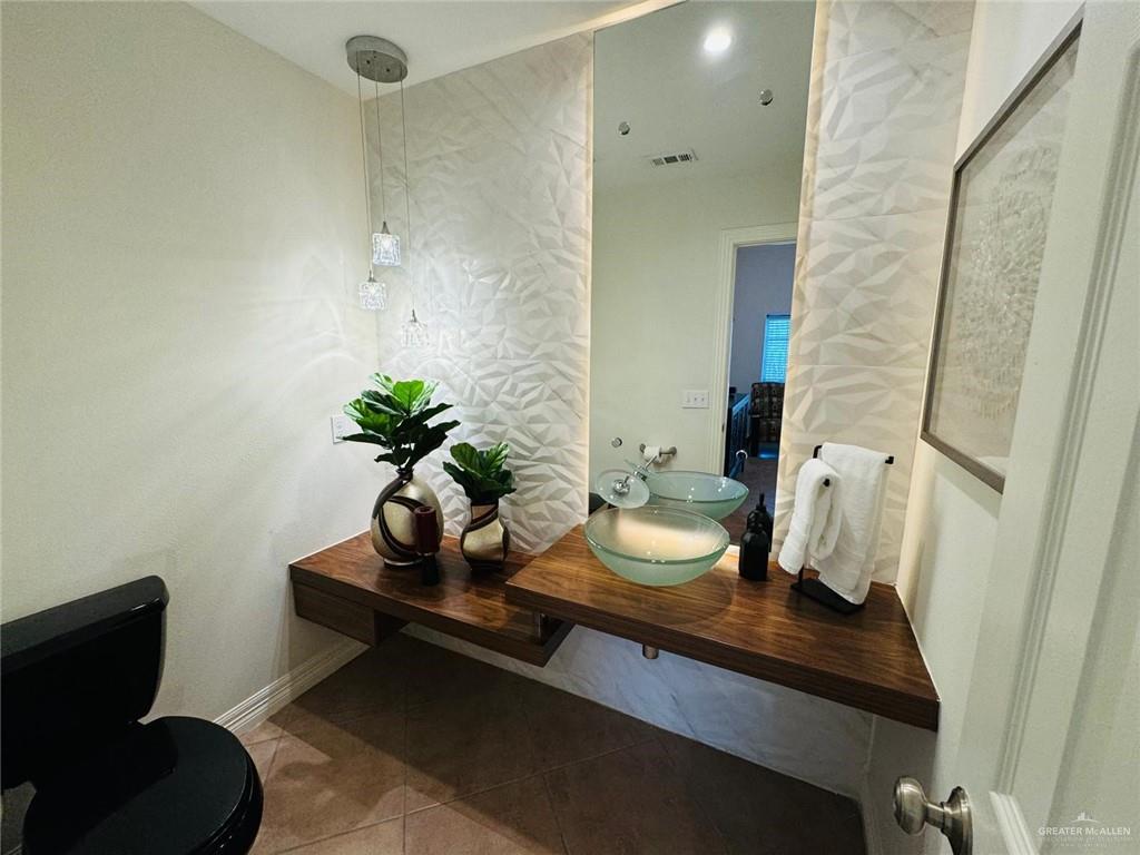 604 Rio Grande Avenue Mission, TX 78572 - Photo 3 of 17 Bathroom featuring tile floors and sink