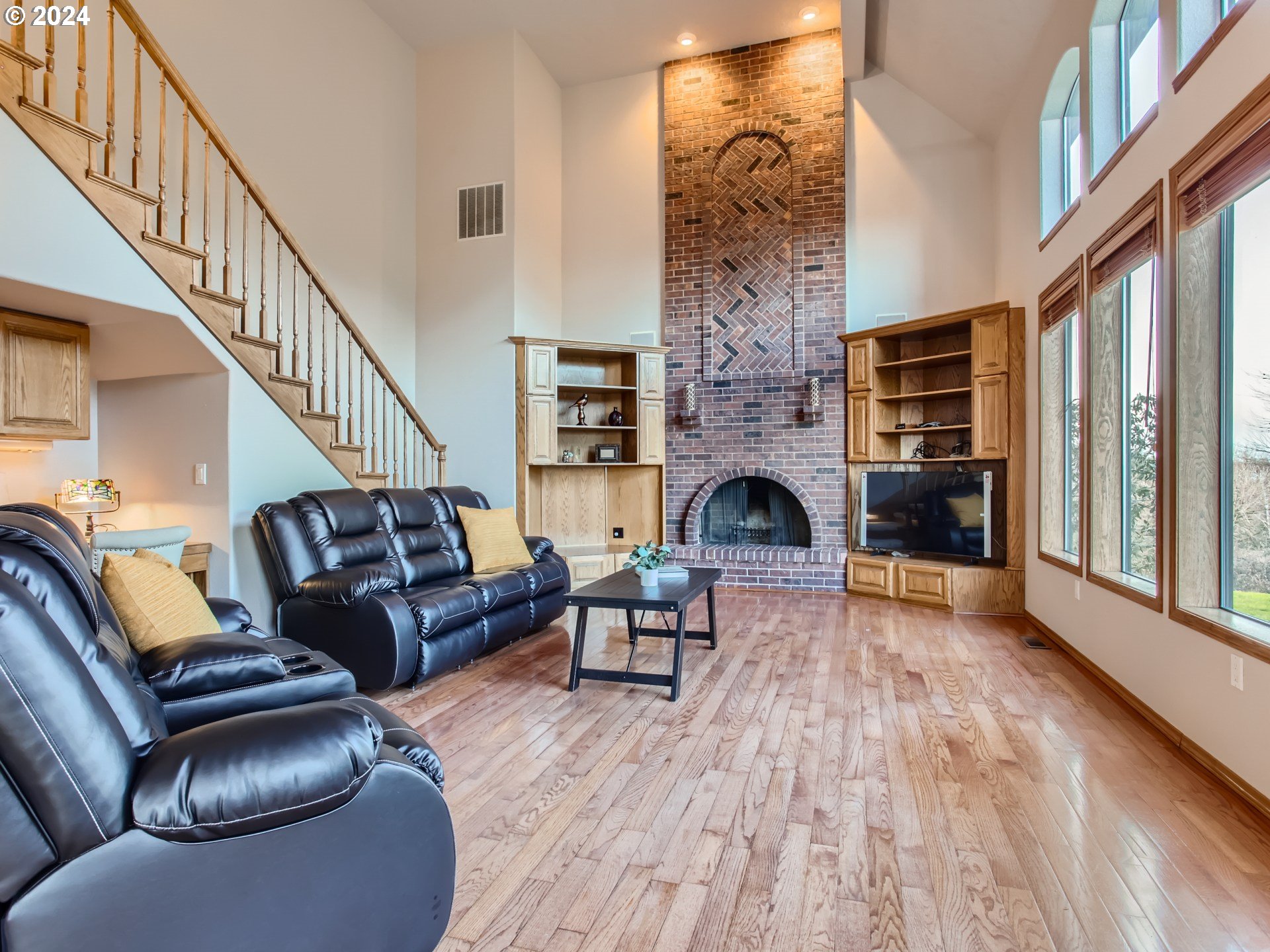1411 Northwest 211th Circle Ridgefield, WA 98642 - Photo 17 of 47 a living room with furniture and a fireplace