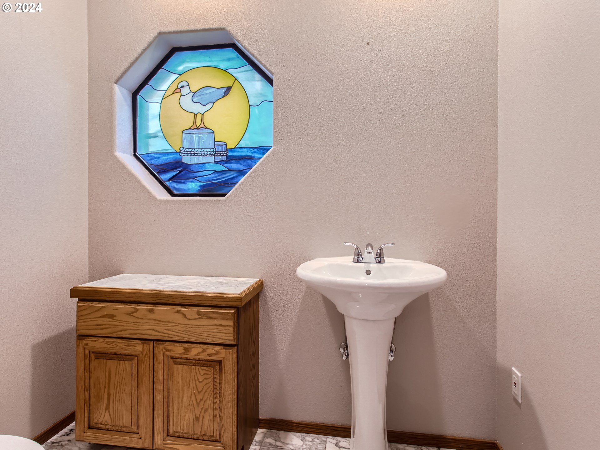 1411 Northwest 211th Circle Ridgefield, WA 98642 - Photo 8 of 47 a bathroom with a sink mirror and vanity