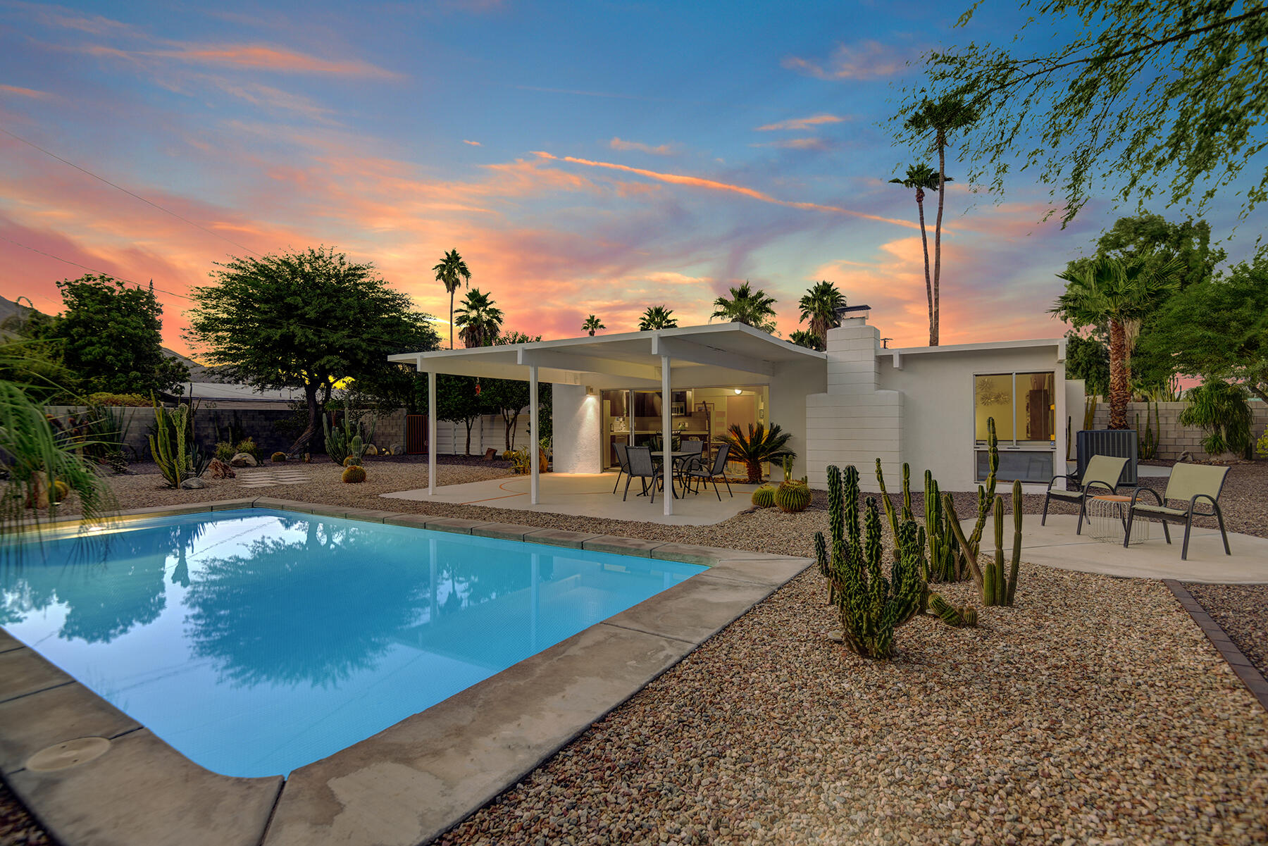 565 East Racquet Club Road Palm Springs, CA 92262 - Photo 1 of 38 POOL TO BACK OF HOUSE NIGHT MLS