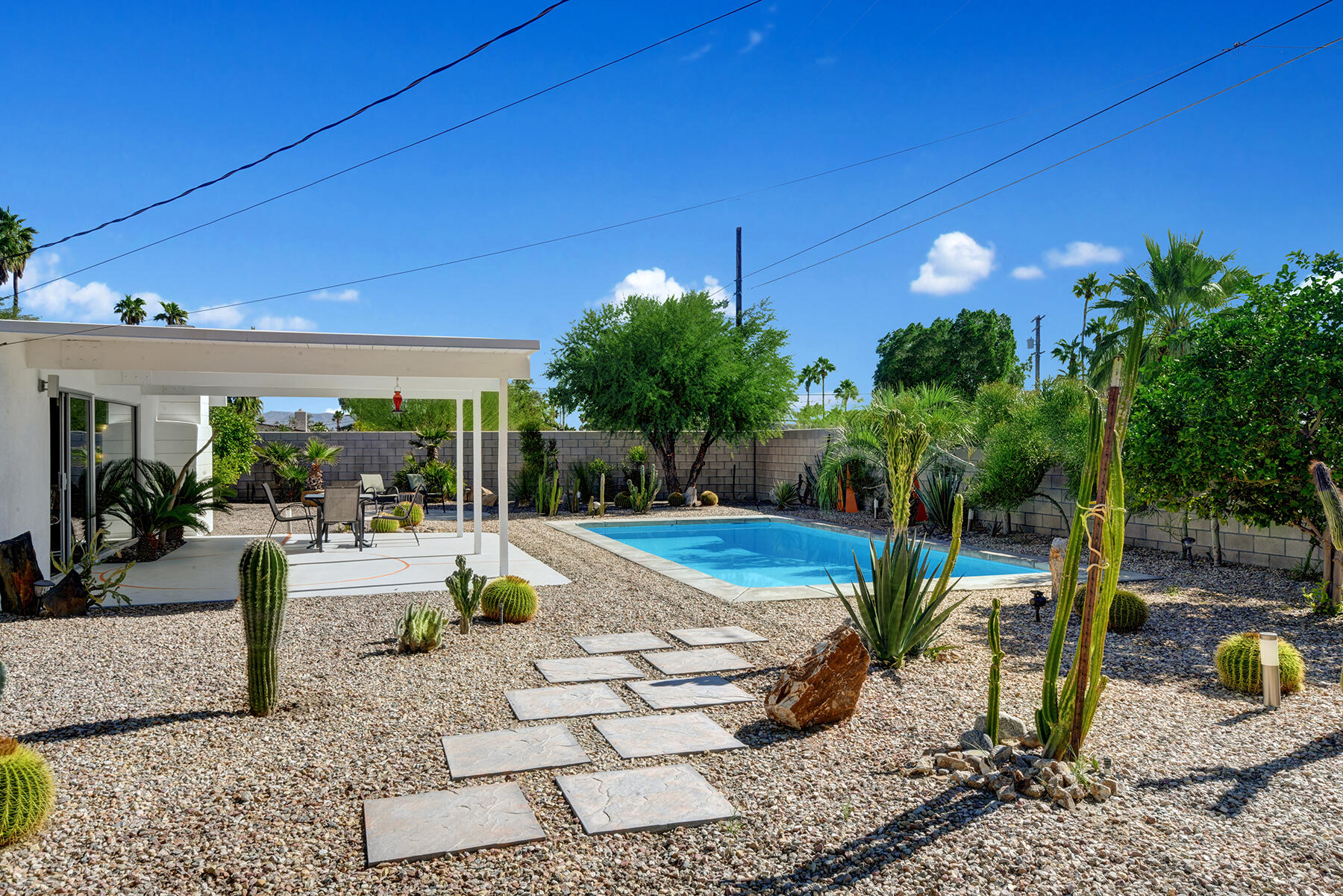 565 East Racquet Club Road Palm Springs, CA 92262 - Photo 31 of 38 POOL YARD SOUTHEAST PULLED BACK MLS