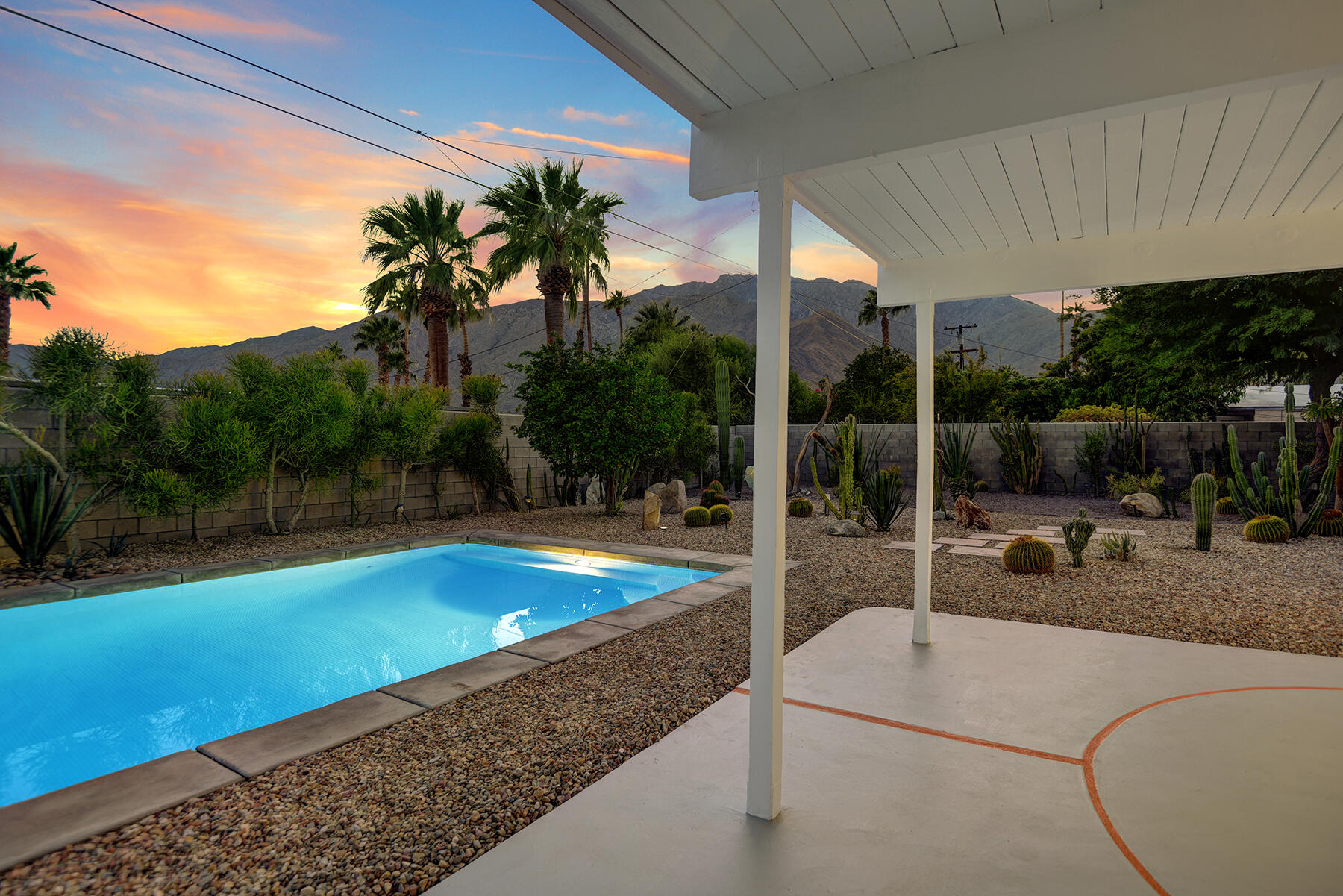 565 East Racquet Club Road Palm Springs, CA 92262 - Photo 37 of 38 BACK COVERED PATIO TO POOL AND MOUNTAINS