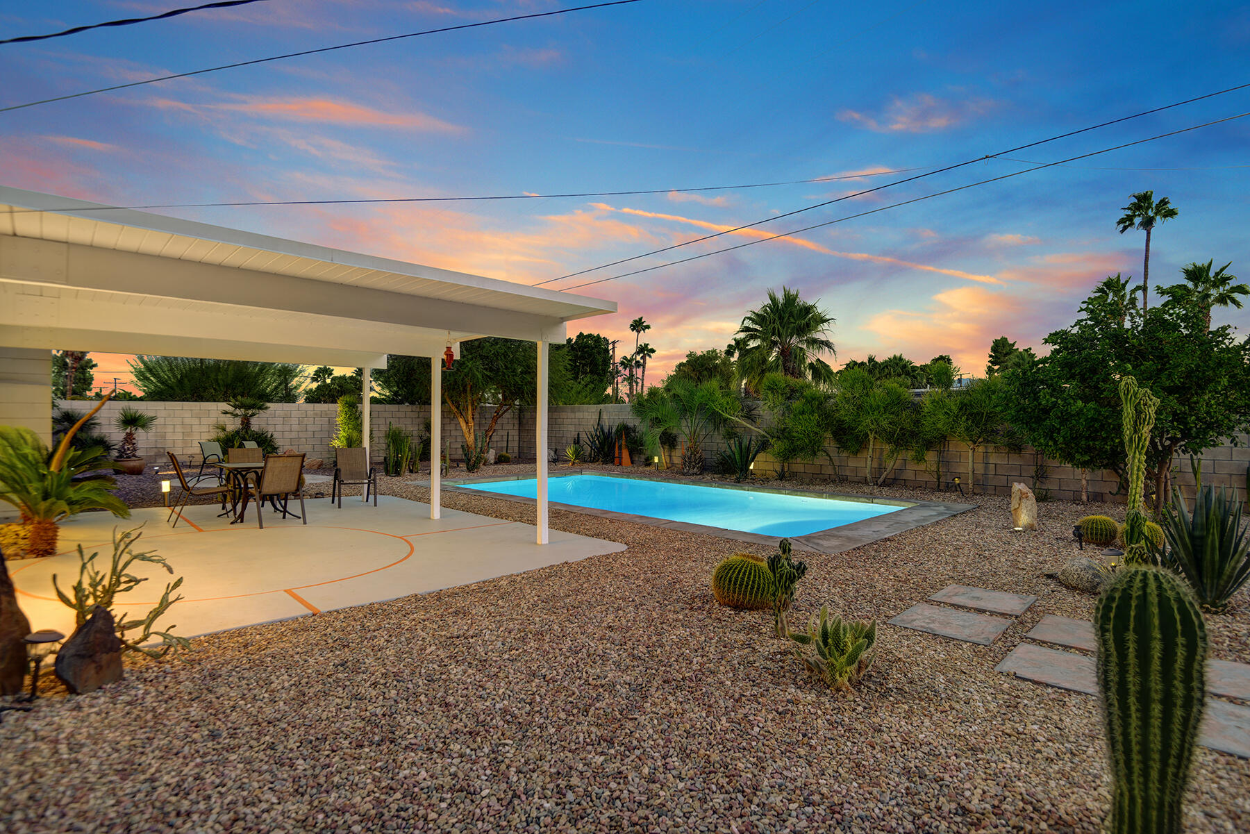 565 East Racquet Club Road Palm Springs, CA 92262 - Photo 38 of 38 BACK COVERED PATIO TO POOL NIGHT MLS