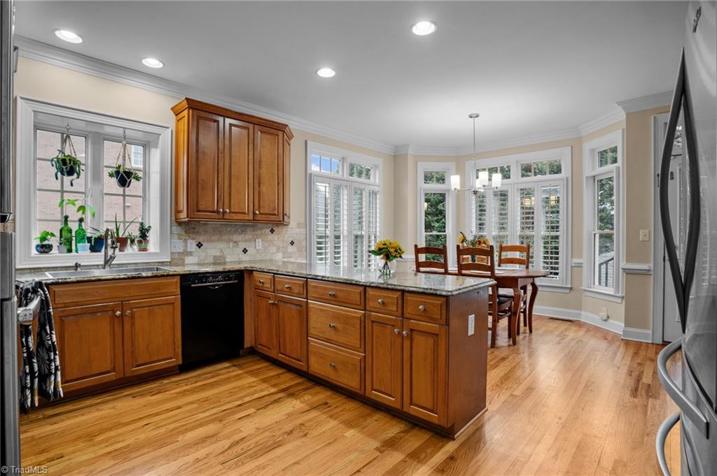 133 Windrush Road Winston-Salem, NC 27106 - Photo 12 of 50 Plantation Shutters on windows Main & Upper Level
