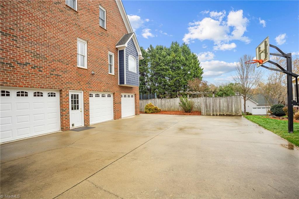 133 Windrush Road Winston-Salem, NC 27106 - Photo 38 of 50 3 Car Garage- perfect space for Basketball Court