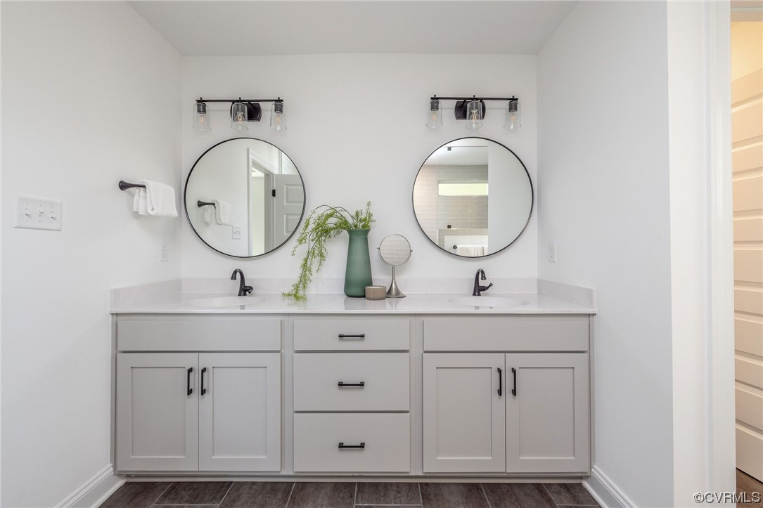 9107 Copplestone Road Chesterfield, VA 23832 - Photo 18 of 22 a view of mirror with washer and mirror