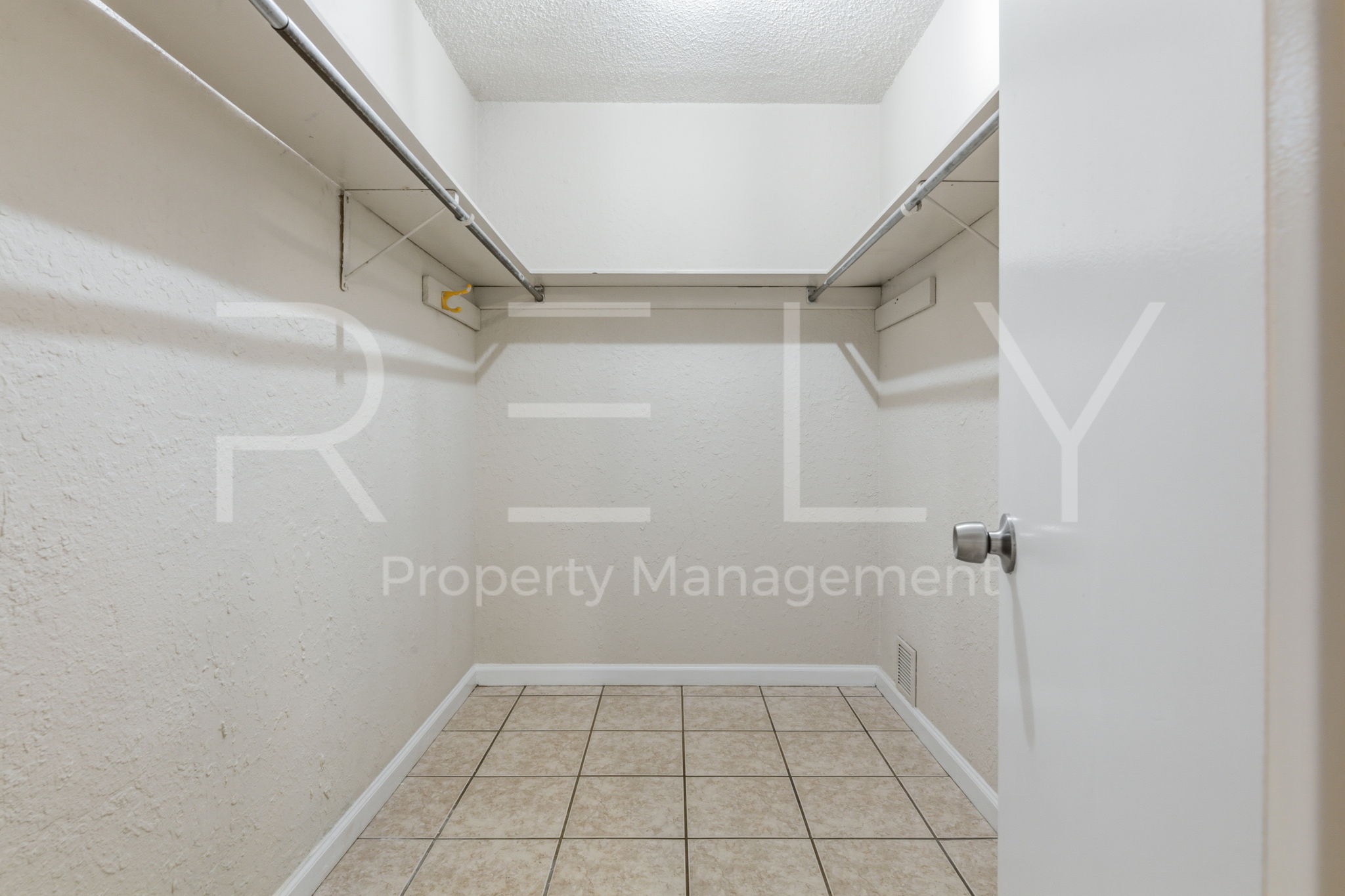 1005 Milford Way, Unit A Austin, TX 78745 - Photo 22 of 30 a view of an empty walk in closet