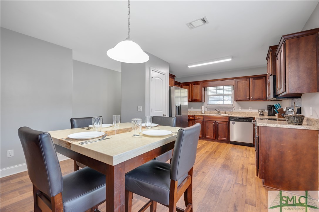 111 Crossing Circle Rincon, GA 31326 - Photo 6 of 34 Dining Room to Kitchen