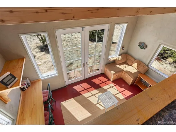 a backyard of a house with barbeque oven