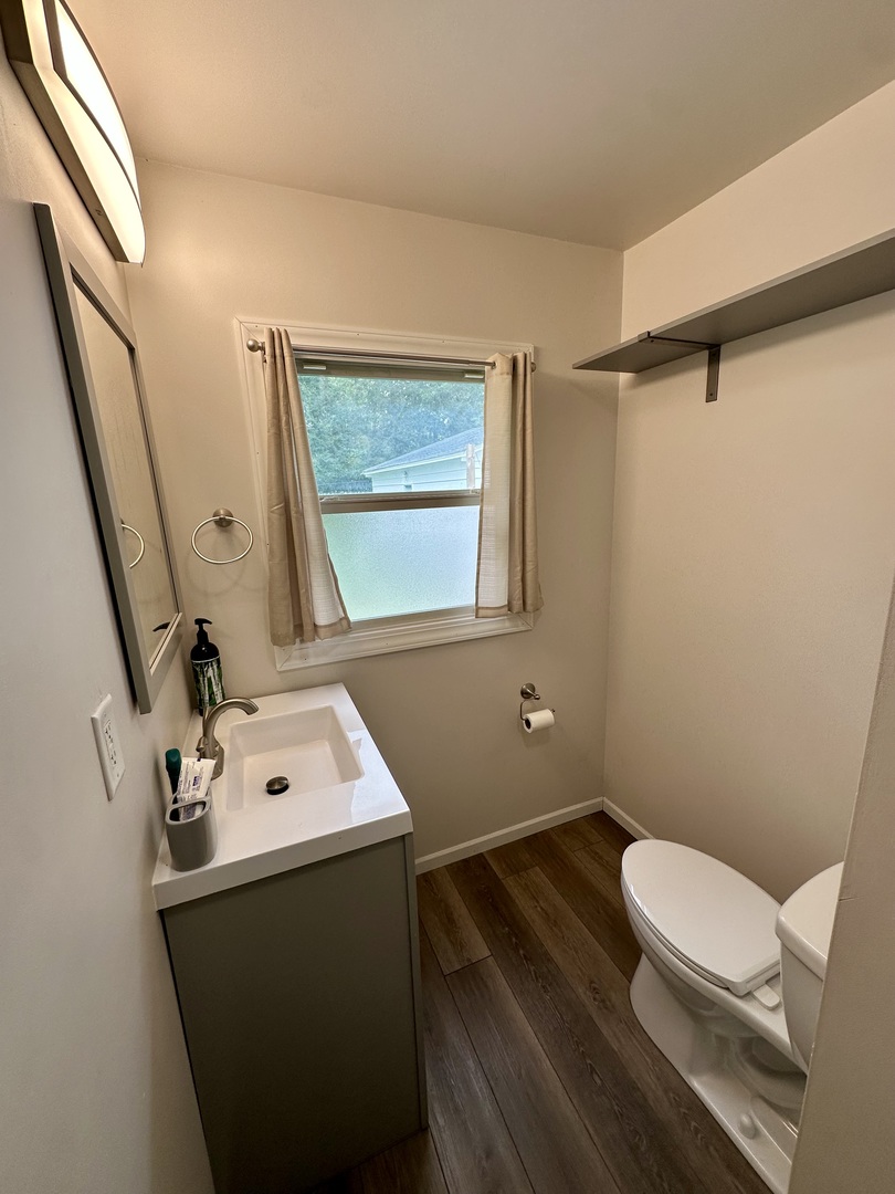 925 Assembly Place Dixon, IL 61021 - Photo 13 of 19 a bathroom with a sink toilet and window