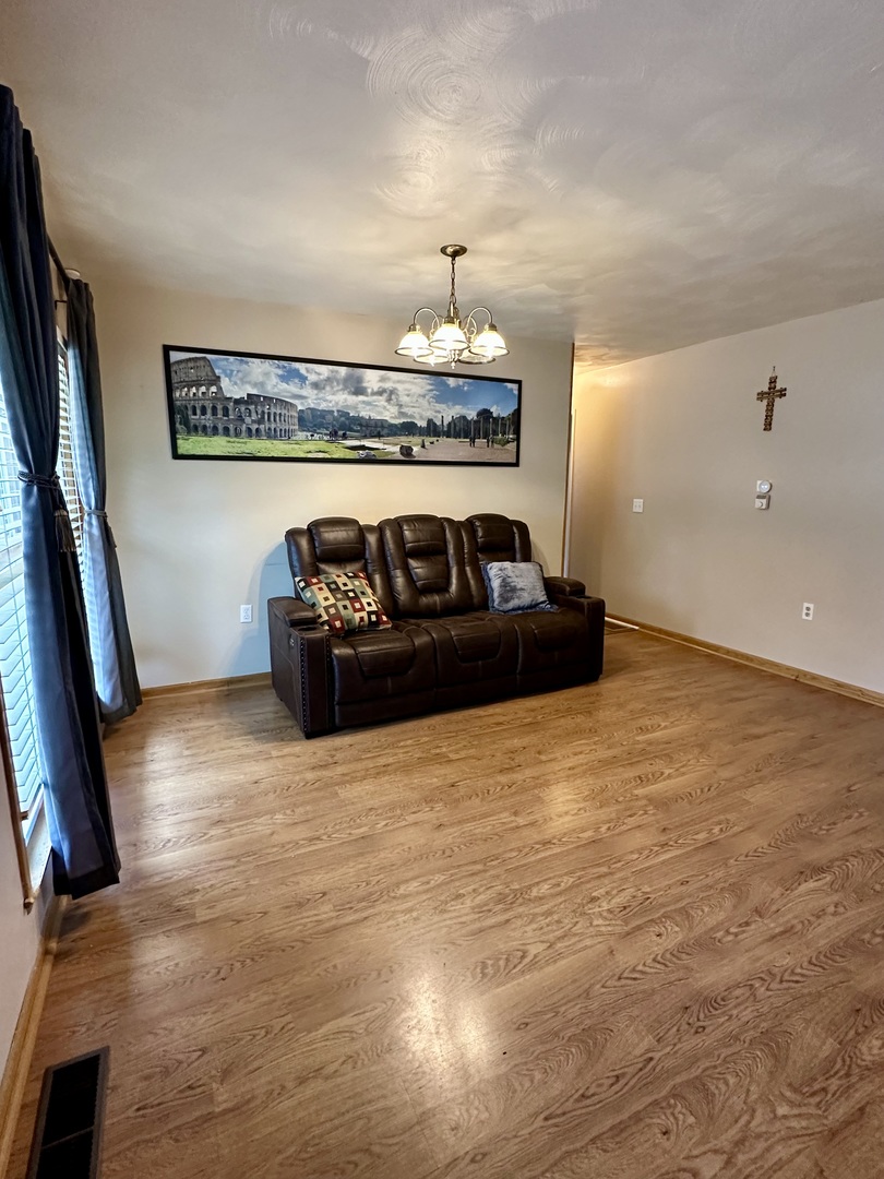 925 Assembly Place Dixon, IL 61021 - Photo 8 of 19 a bedroom with a bed and a flat screen tv