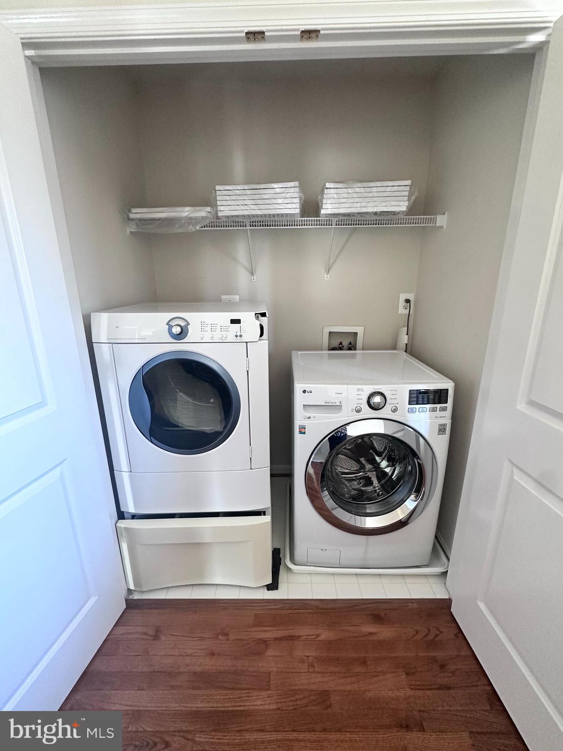 43270 Sunderleigh Square Broadlands, VA 20148 - Photo 14 of 24 a utility room with dryer and washer