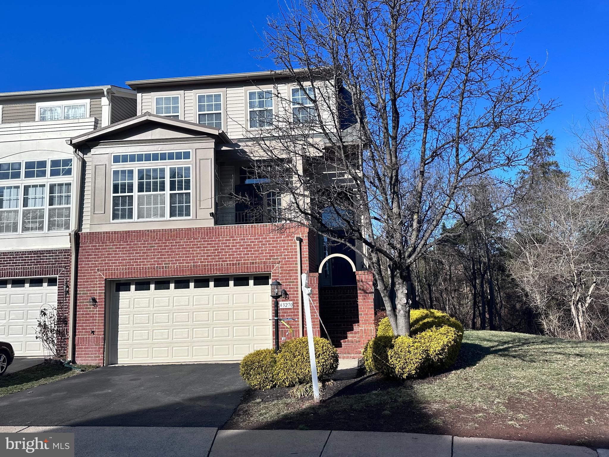 43270 Sunderleigh Square Broadlands, VA 20148 - Photo 24 of 24 a front view of a house with garden