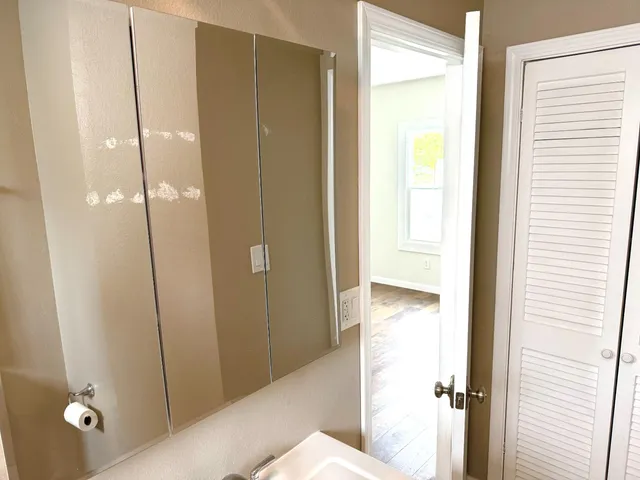 a bathroom with a shower and a tub