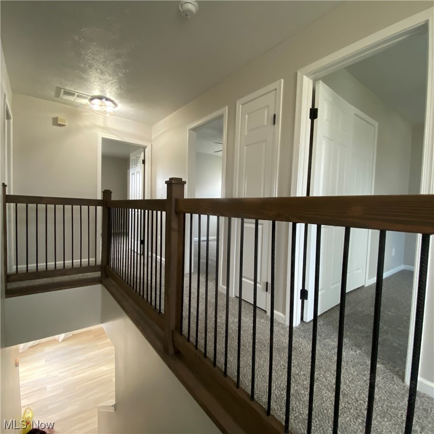 2113 Fowl Road Elyria, OH 44035 - Photo 18 of 39 Custom contemporary railing in upstair hall featuring