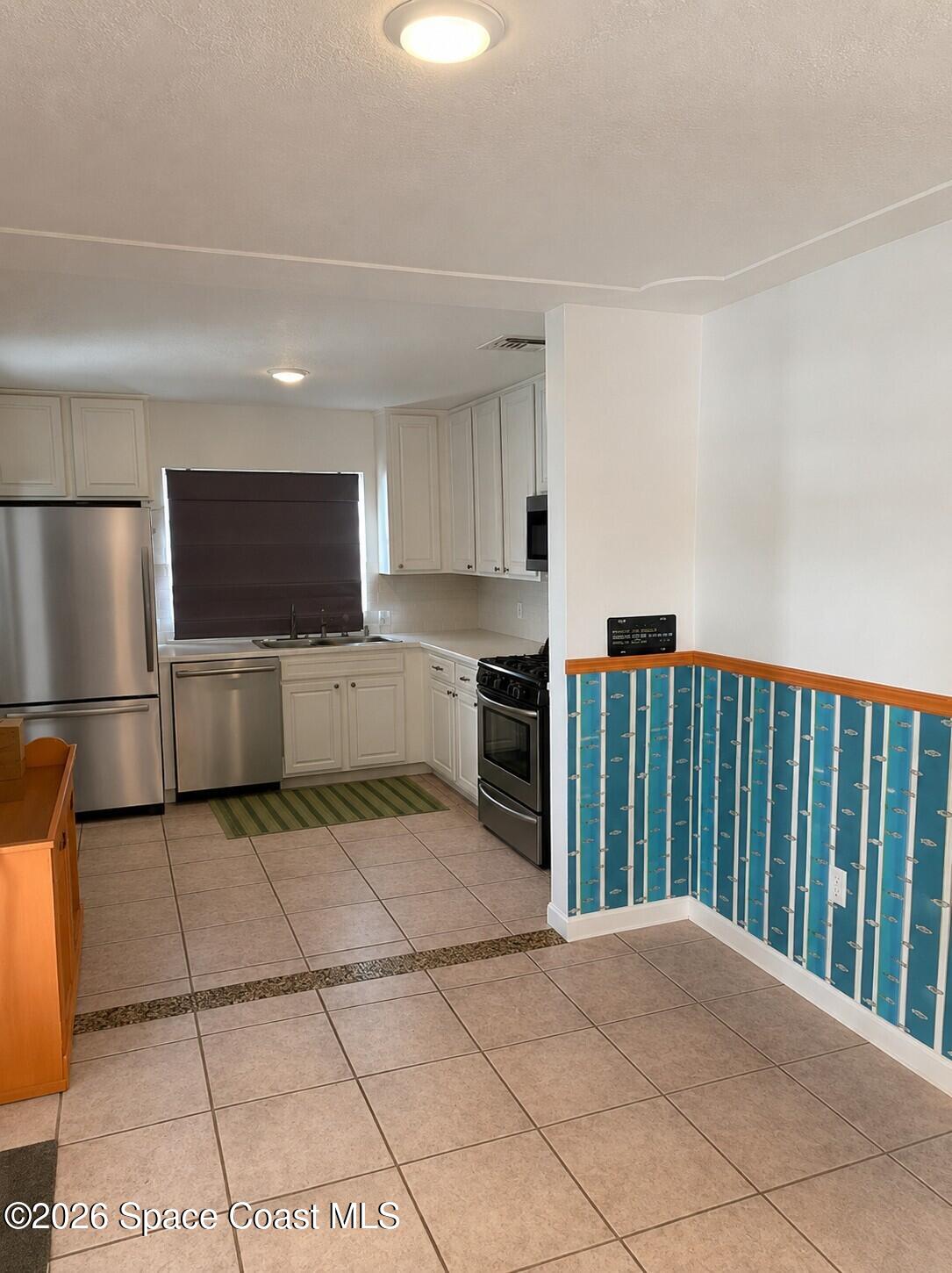 349 West Exeter Street Satellite Beach, FL 32937 - Photo 3 of 16 Dinning/Kitchen