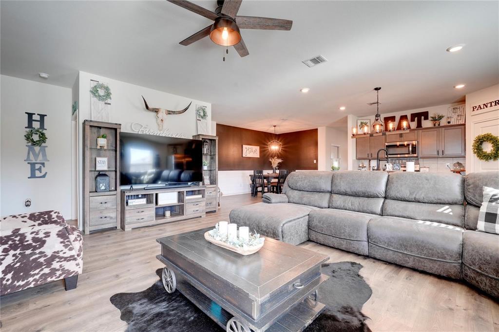 830 Rustic Way Josephine, TX 75189 - Photo 13 of 33 Living area featuring a chandelier, a ceiling fan, light wood-style flooring, and recessed lighting
