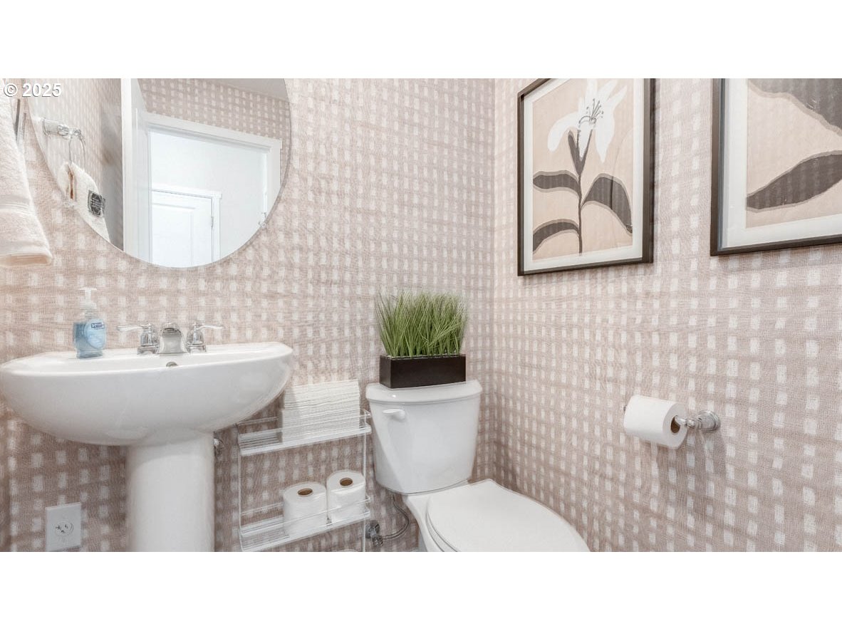 3528 Southwest Hartley Avenue Gresham, OR 97080 - Photo 12 of 25 a bathroom with a sink mirror and toilet