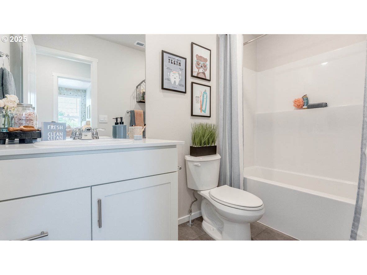 3528 Southwest Hartley Avenue Gresham, OR 97080 - Photo 15 of 25 a bathroom with a sink a toilet and shower