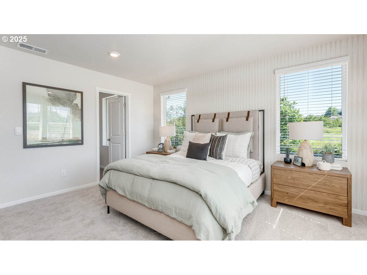 3528 Southwest Hartley Avenue Gresham, OR 97080 - Photo 21 of 25 a living room with a bed furniture and a large window