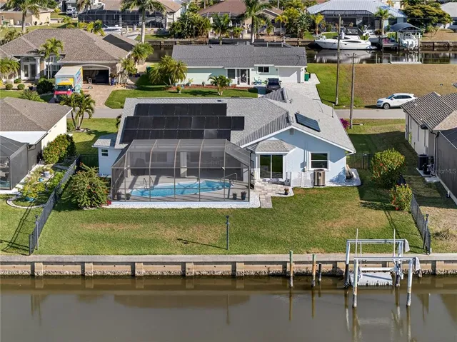 a view of a lake with a house