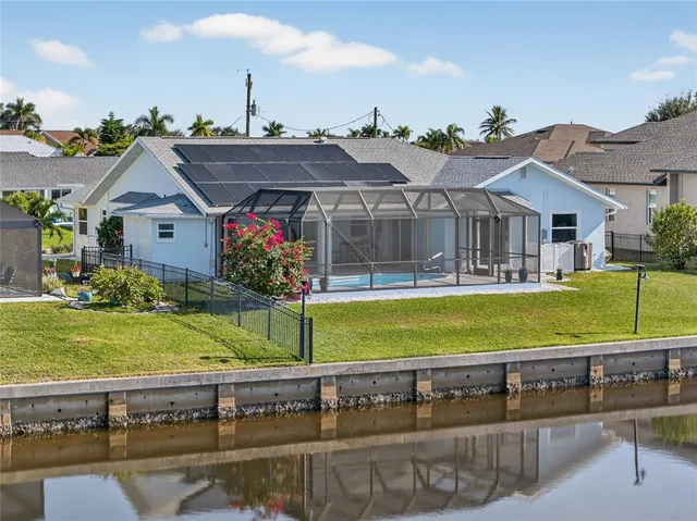 a view of a house with a swimming pool