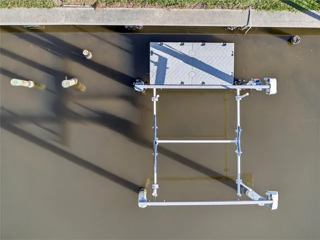 an empty room with wooden floor