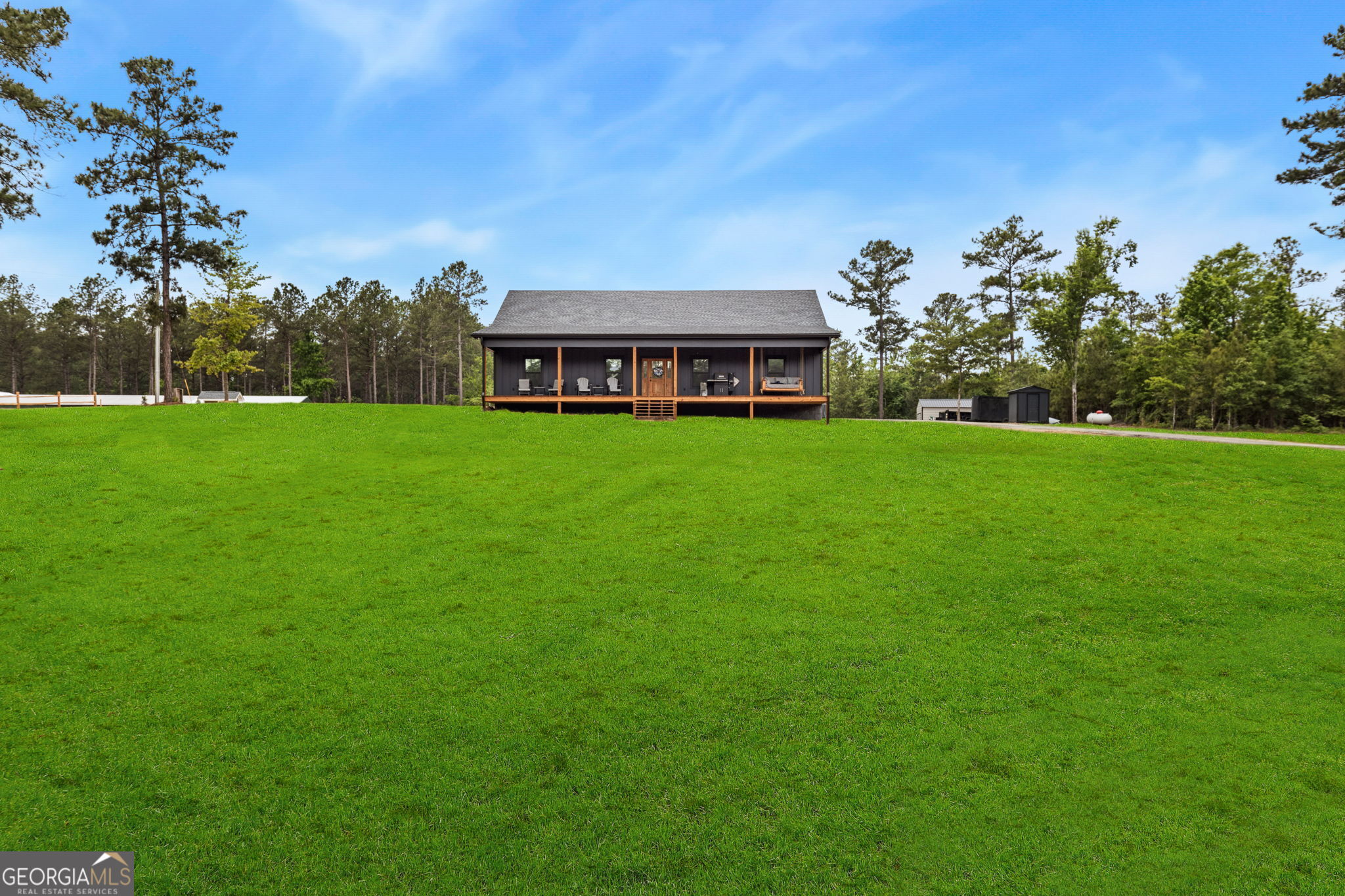 51 Prong Road Swainsboro, GA 30401 - Photo 1 of 55 a view of a house with a garden