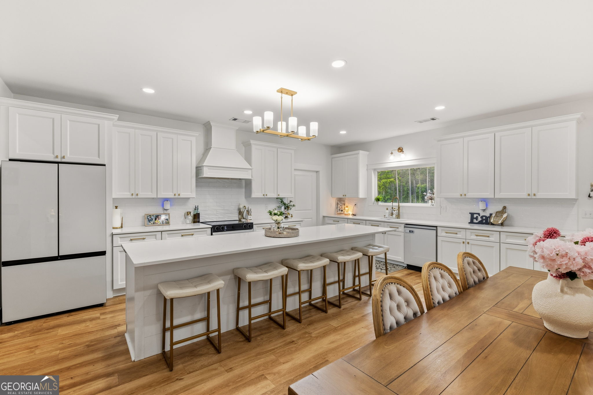 51 Prong Road Swainsboro, GA 30401 - Photo 14 of 55 a large white kitchen with lots of counter space and furniture