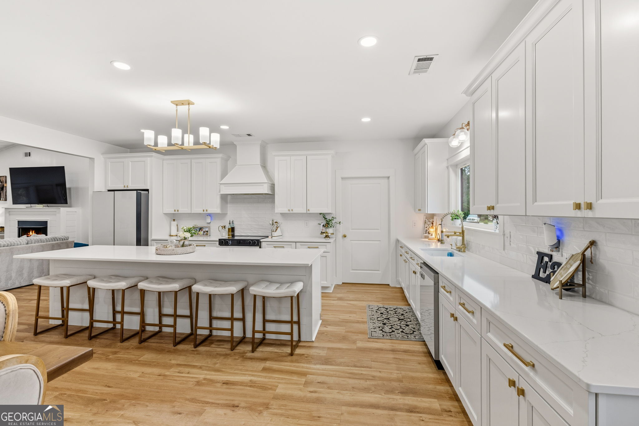 51 Prong Road Swainsboro, GA 30401 - Photo 19 of 55 a large white kitchen with lots of counter space and appliances