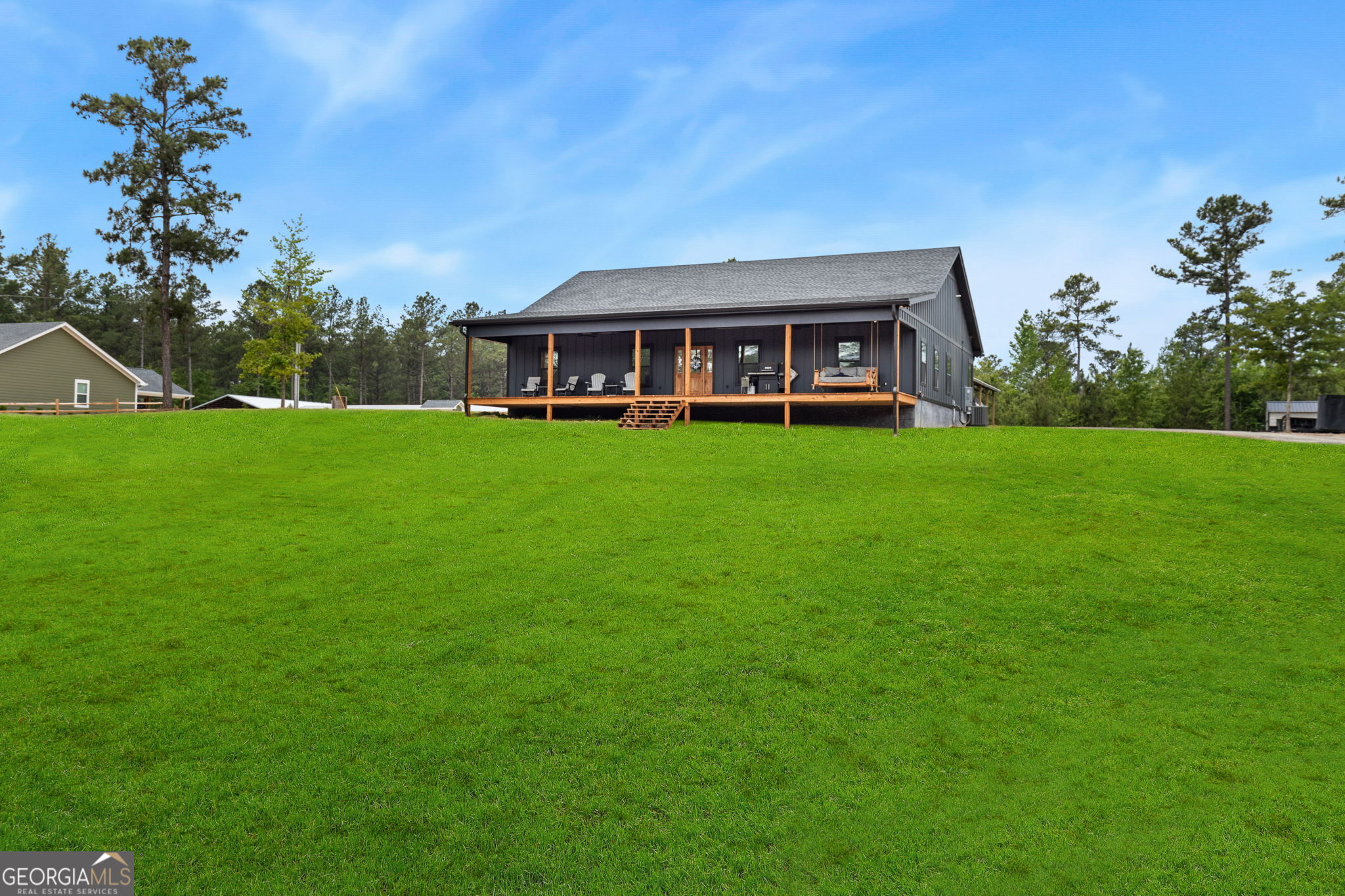 51 Prong Road Swainsboro, GA 30401 - Photo 2 of 55 a view of a house with a garden