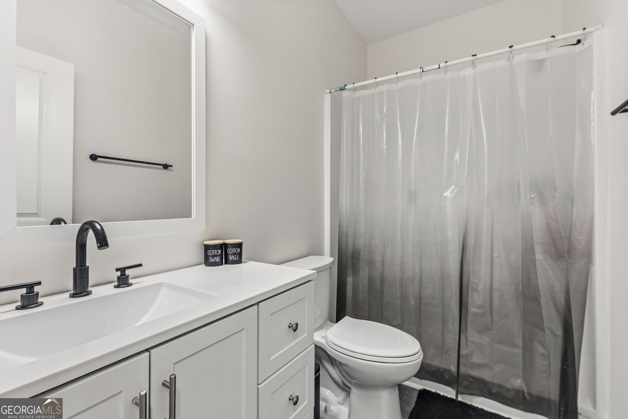 51 Prong Road Swainsboro, GA 30401 - Photo 29 of 55 a bathroom with a sink a toilet and shower