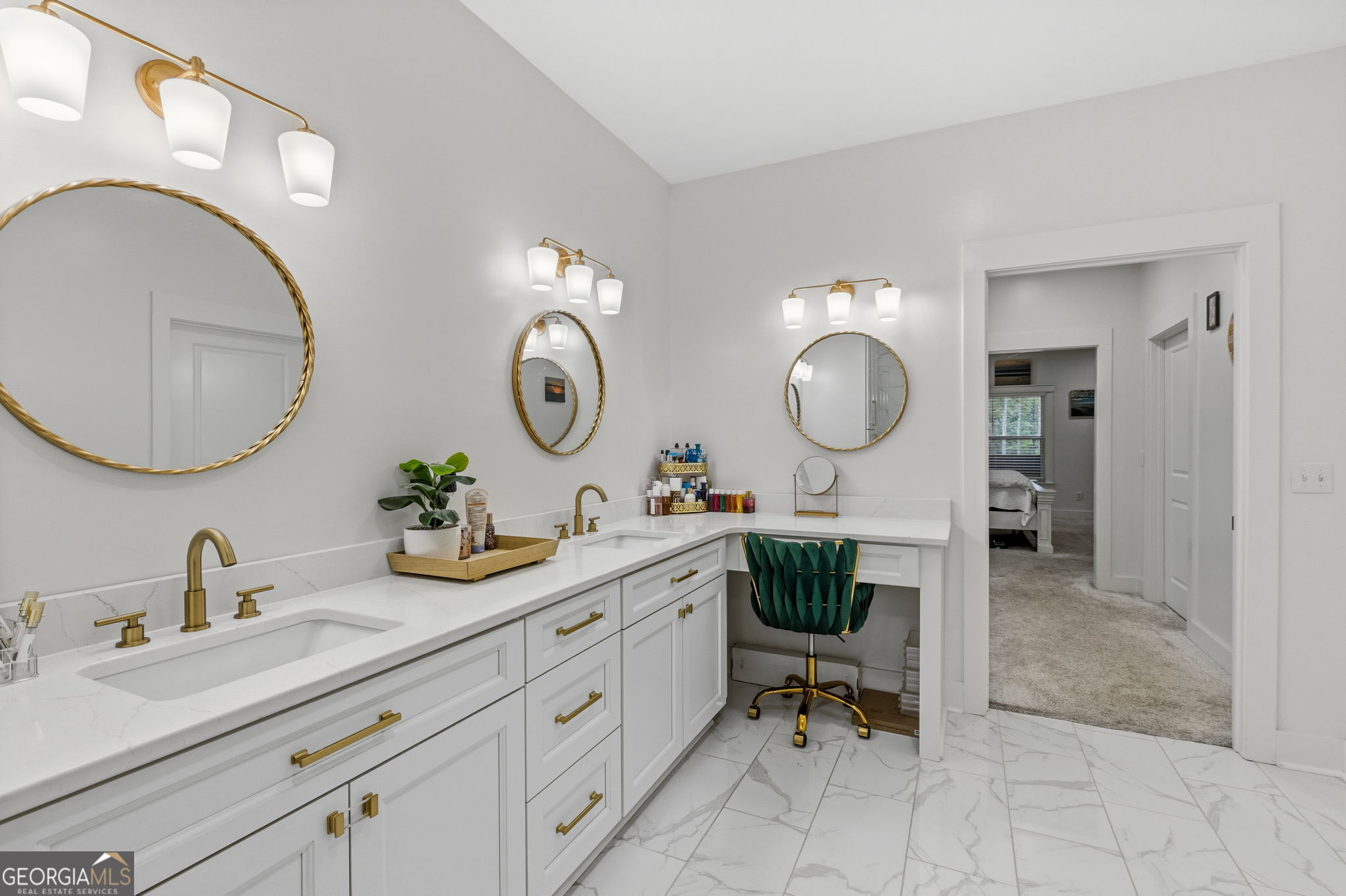 51 Prong Road Swainsboro, GA 30401 - Photo 37 of 55 a spacious bathroom with a toilet a double vanity and a mirror