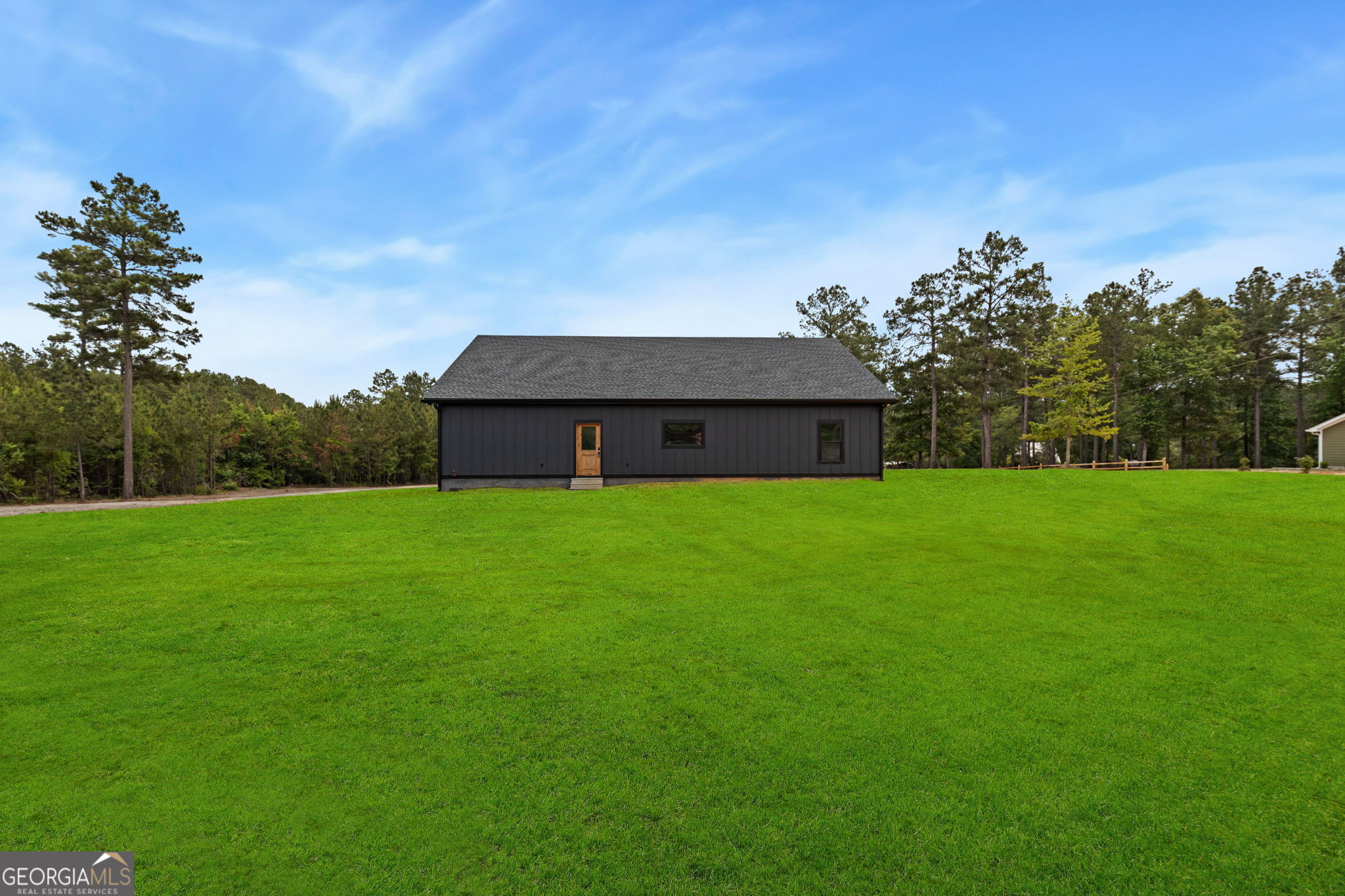 51 Prong Road Swainsboro, GA 30401 - Photo 41 of 55 a house view with a garden space