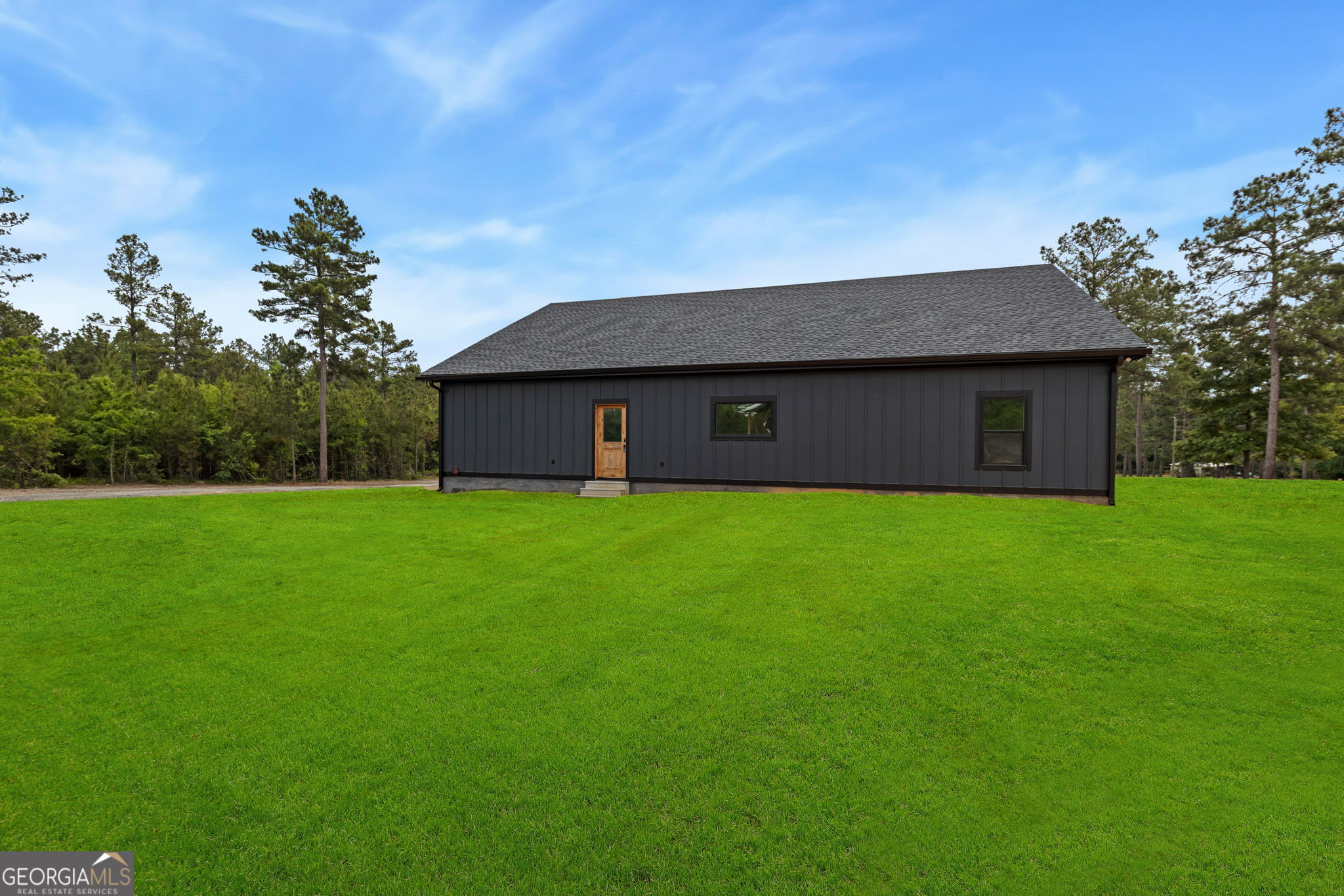 51 Prong Road Swainsboro, GA 30401 - Photo 42 of 55 a house view with a garden space