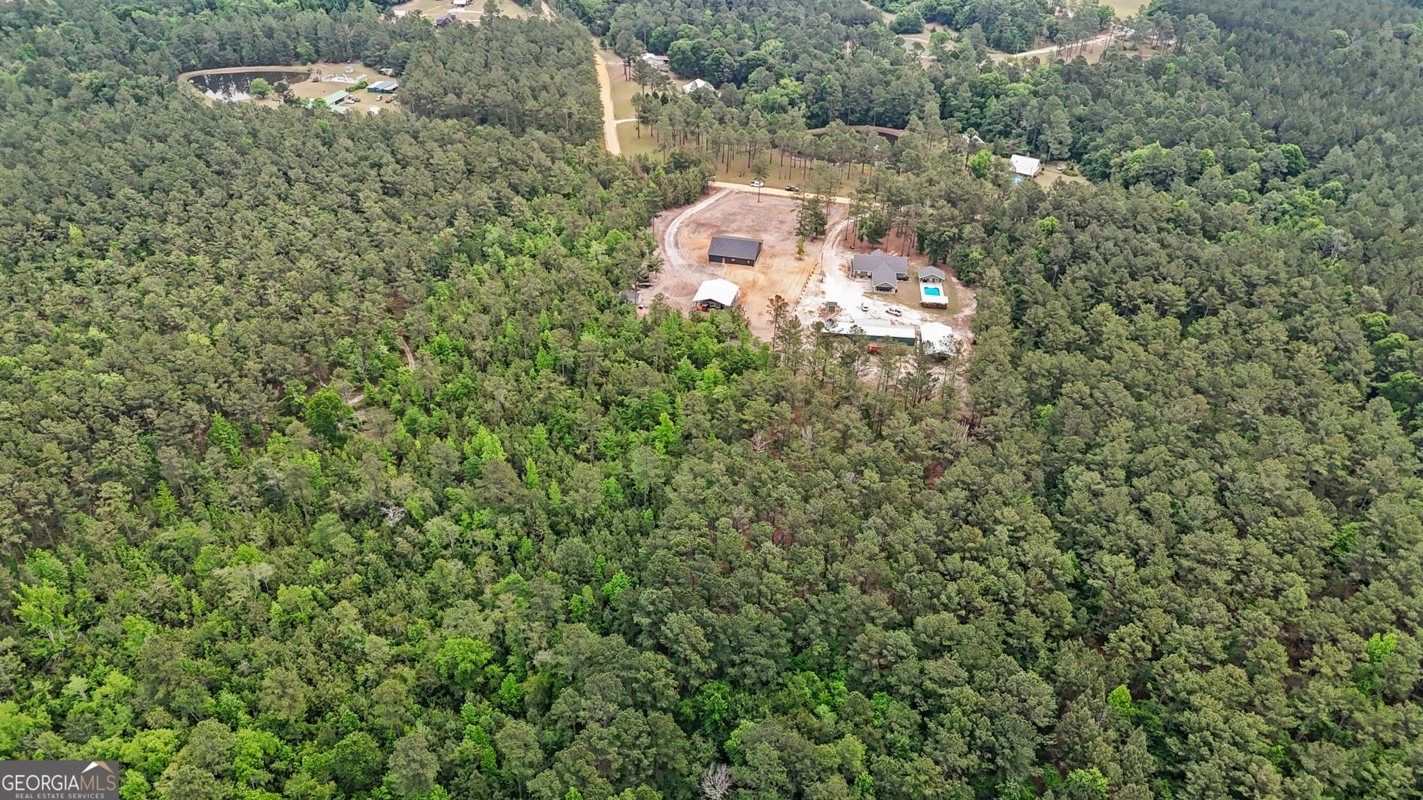 51 Prong Road Swainsboro, GA 30401 - Photo 50 of 55 an aerial view of a house with yard and outdoor space