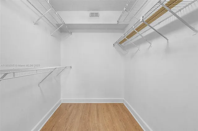 a view of a room with racks on the wall