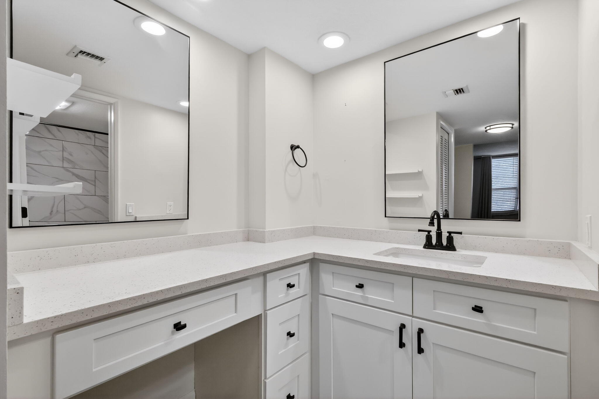 545 Oaks Lane, Unit 409 Pompano Beach, FL 33069 - Photo 14 of 25 a bathroom with a sink and a mirror