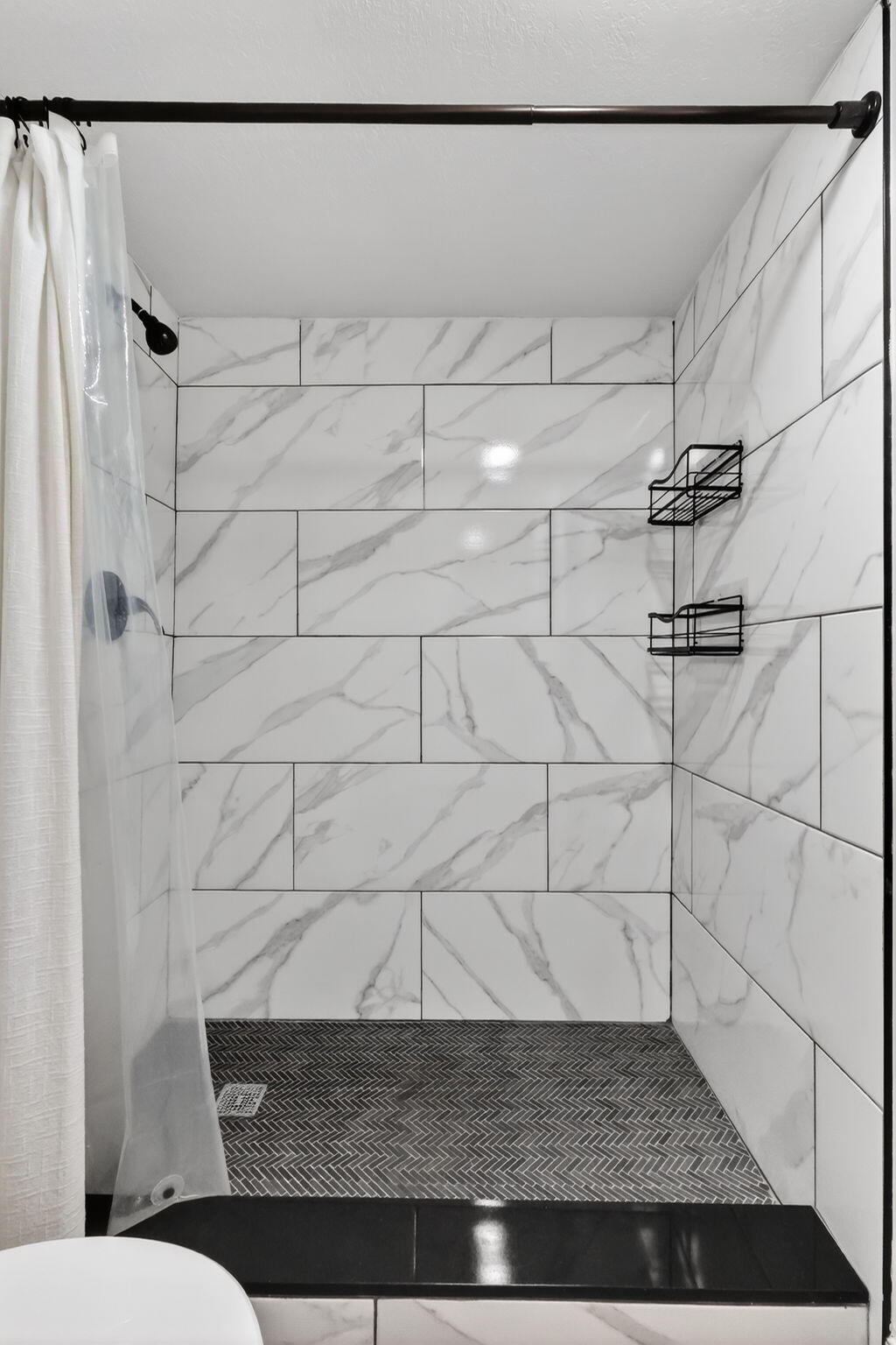 545 Oaks Lane, Unit 409 Pompano Beach, FL 33069 - Photo 15 of 25 a bathroom with a sink and a shower