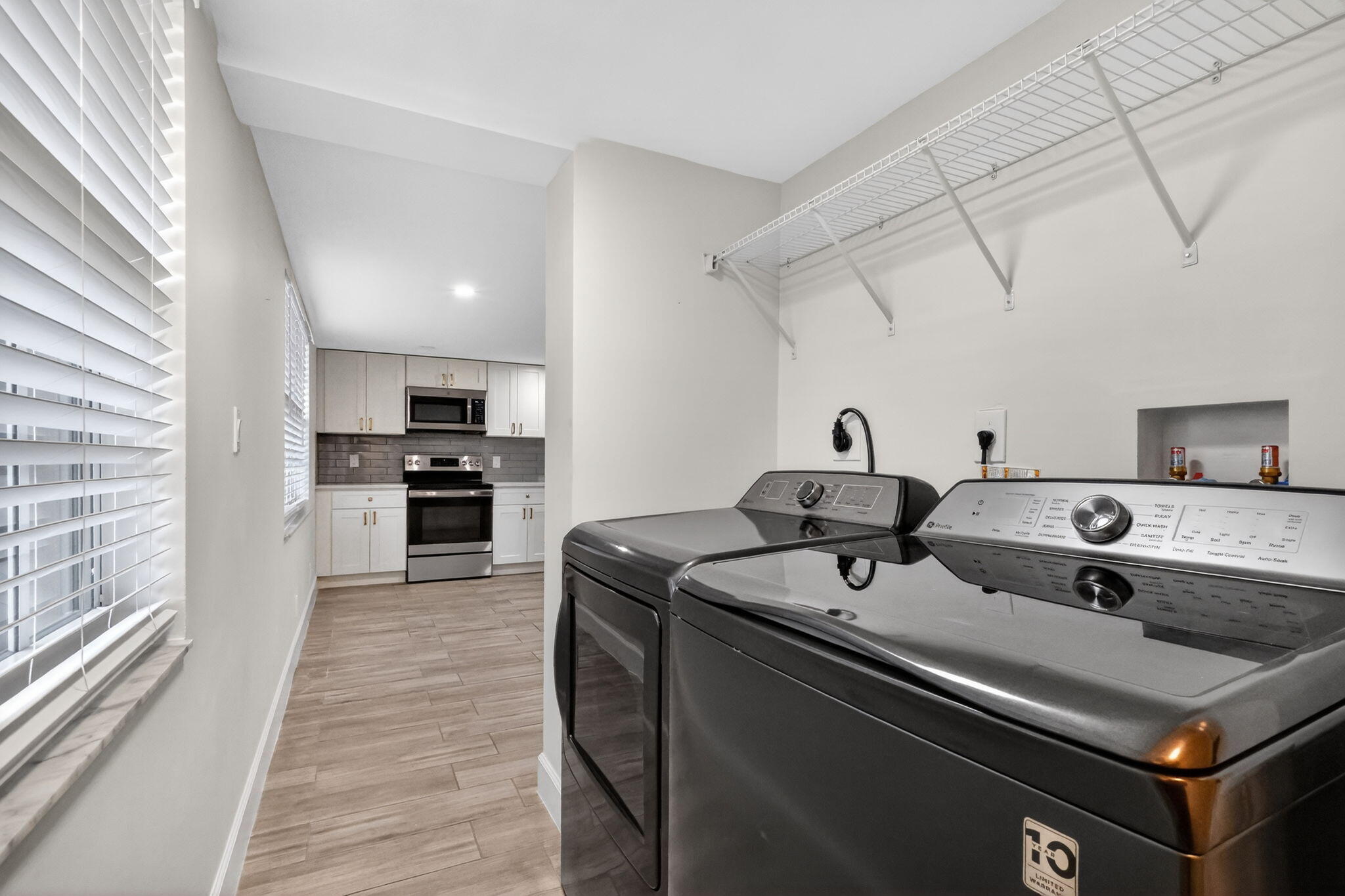 545 Oaks Lane, Unit 409 Pompano Beach, FL 33069 - Photo 25 of 25 a kitchen with stainless steel appliances granite countertop a sink dishwasher stove and refrigerator