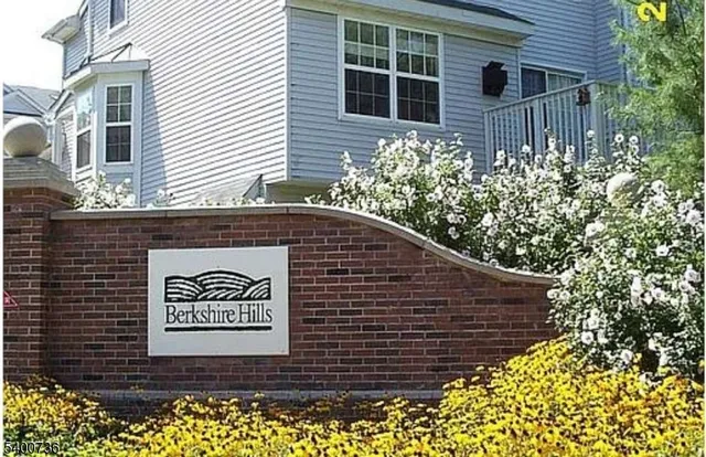 a brick building with a large window